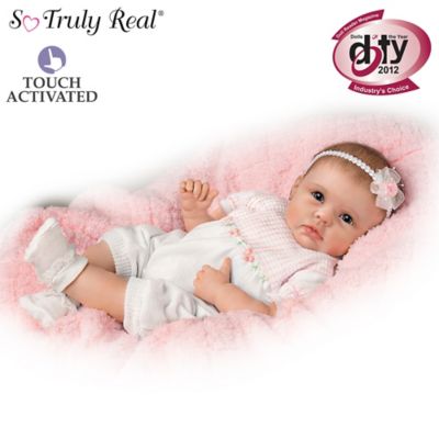 Lifelike Interactive Baby Doll Really “Holds” Your Hand